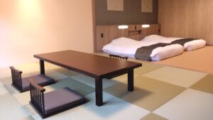 Tatami room with low table and twin futons