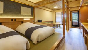 Twin beds in a tatami-style guest room