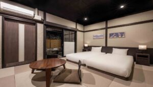 Twin beds in a tatami-style guest room