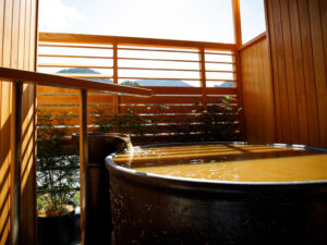 Open-air wooden bath on a private balcony