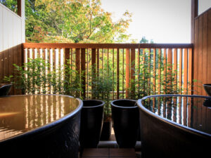 Two private open-air baths on a balcony