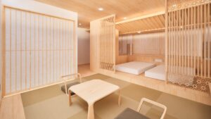 Camera in tatami con tavolo basso e letti rialzati