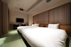 Two beds in a tatami-style guest room