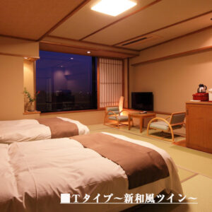 Twin beds in a tatami guest room