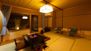 Tatami room with low table and chairs