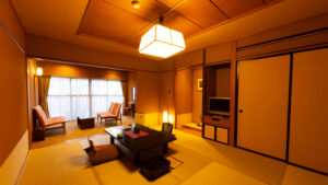 Tatami room with low table and chairs by window
