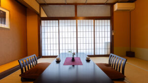 Tatami room with low table and floor chairs