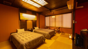 Twin beds in a tatami guest room