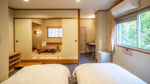 Two beds in a Japanese-style guest room