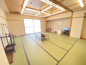Tatami room with low table and television