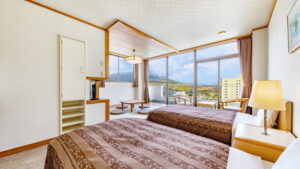 Twin beds in a tatami guest room