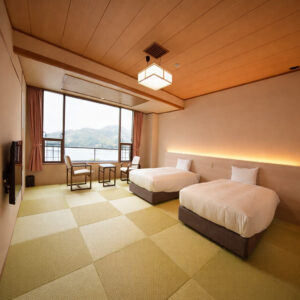 Letti singoli in una camera con tatami