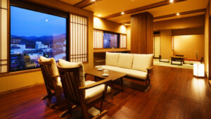 Seating area with sofa, chairs, and low table