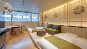 Twin beds in a Japanese-style guest room