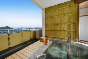Private open-air bath on balcony with bridge view
