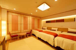 Three beds in a tatami-style guest room