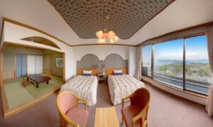 Twin beds in guest room with tatami seating area