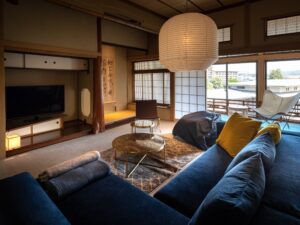 Living area with sofa, chairs, and low table
