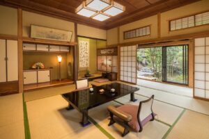 Tatami guest room with low table and floor chairs