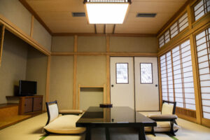 Tatami room with low table and floor chairs
