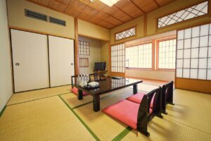 Tatami room with low table and floor chairs
