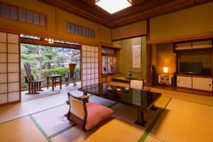 Tatami room with low table and garden chairs