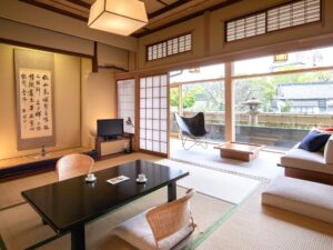 Tatami room with low table and sofa seating