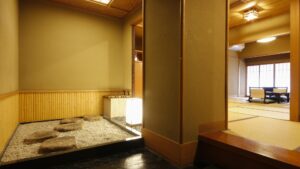 Tatami room with low table and chairs