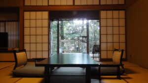 Tatami seating area with low table by garden window