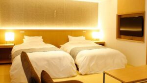 Two twin beds in a ryokan guest room