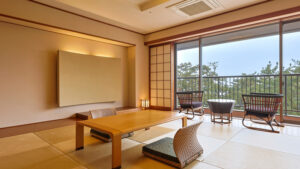 Tatami room with low table and balcony chairs