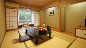 Tatamizimmer mit niedrigem Tisch und Sitzplätzen am Boden
