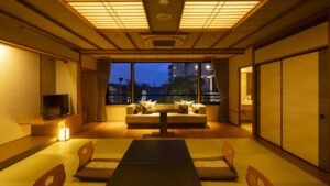 Tatami guest room with low table and floor cushions