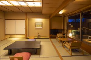Tatami room with low table and chairs by window