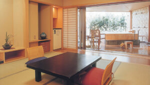 Tatami room with low table and private bath