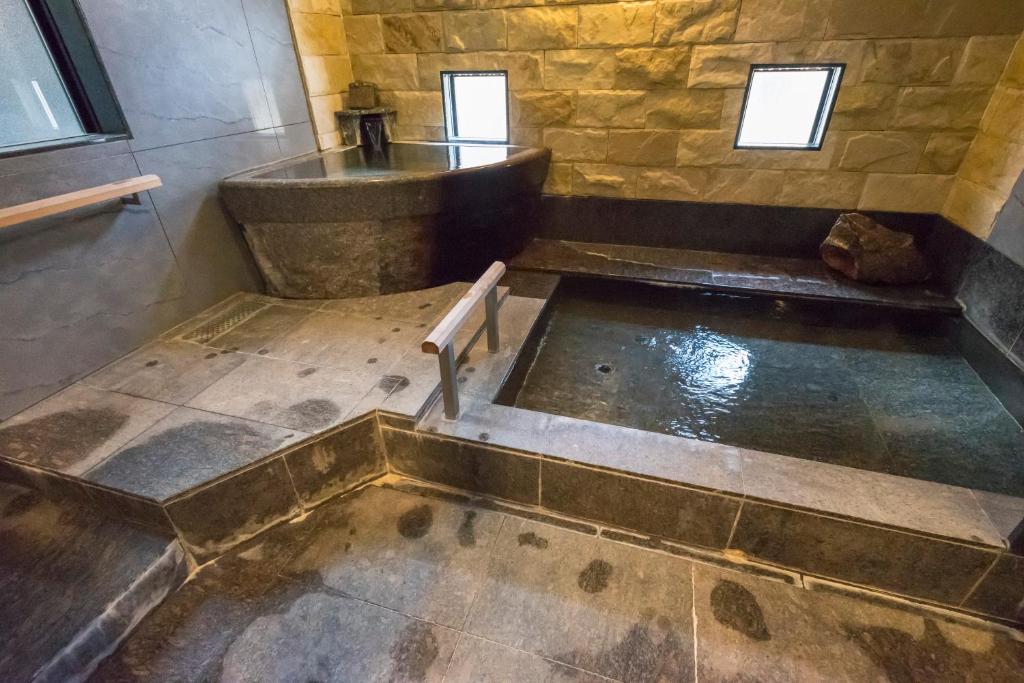 Awara Grand Hotel Stone Onsen Bath