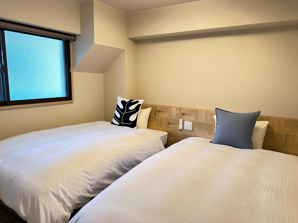 Garland Court Usami Twin Bedroom