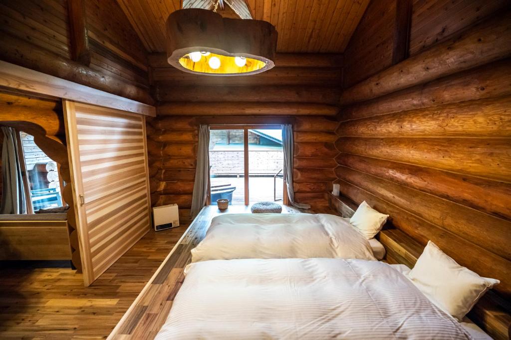 Hatcho No Yu Log Cabin Bedroom