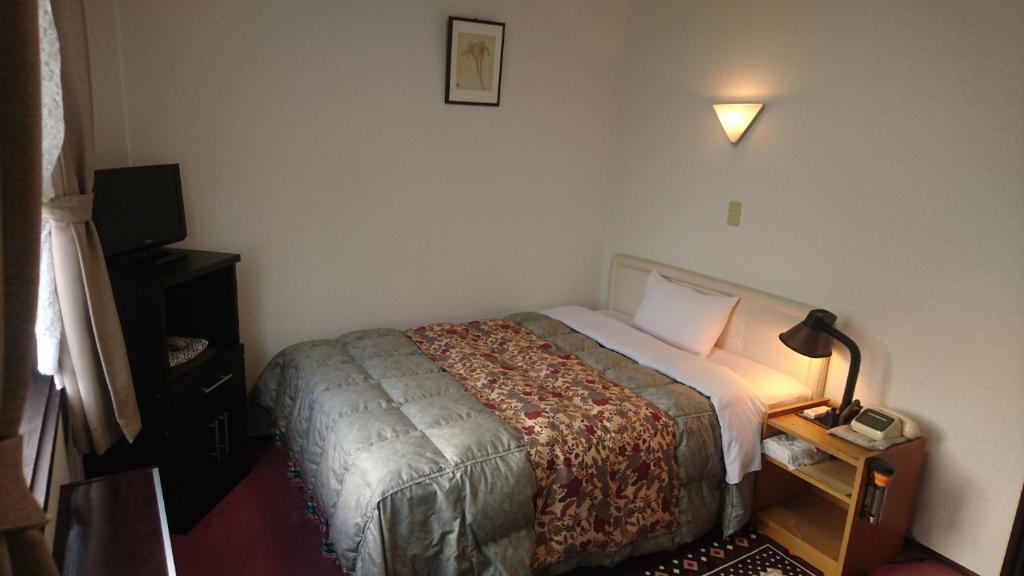 Hotel Mumon Bed Room