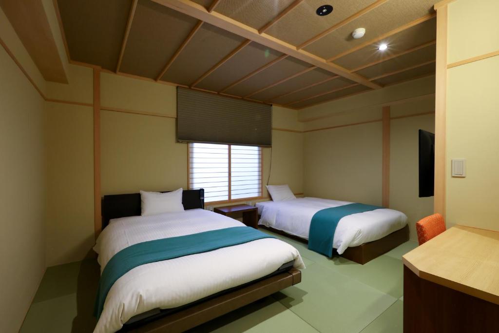 Hotel Tamanoyu Twin Room