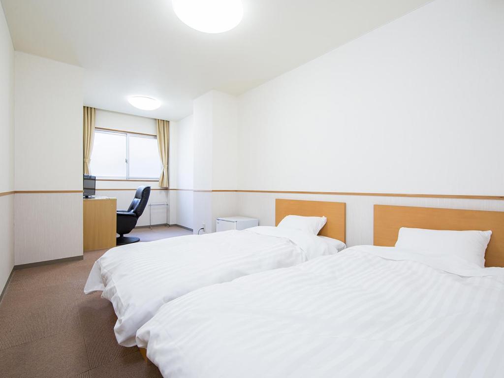 Itoen Hotel Asamanoyu Twin Room