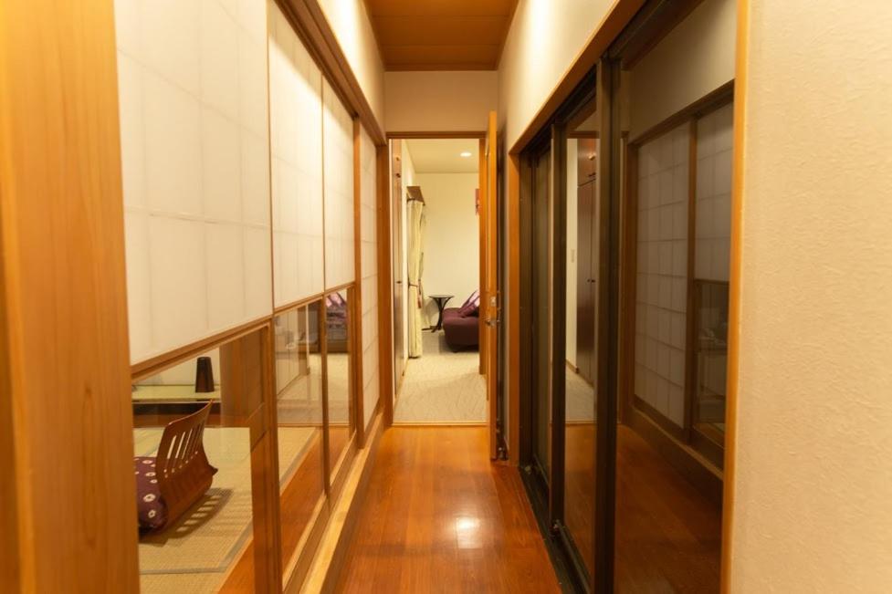 Mangetsu Ajiro Ryokan Hallway Tatami Room