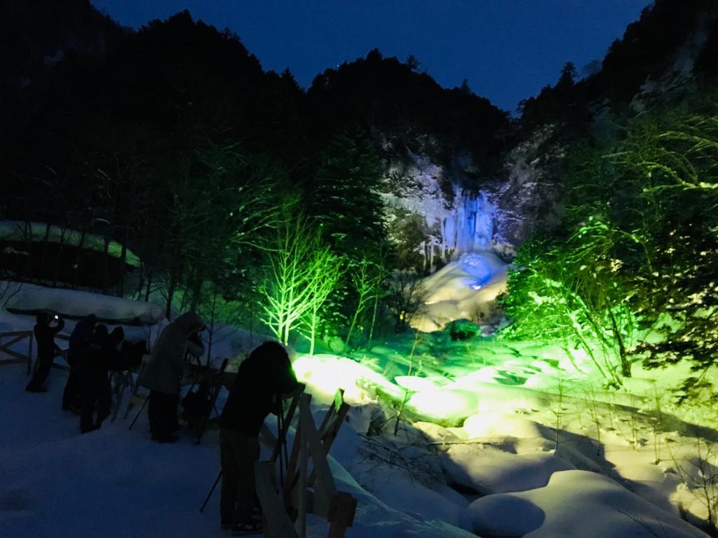 Mozumo Illuminated Snowy Waterfall