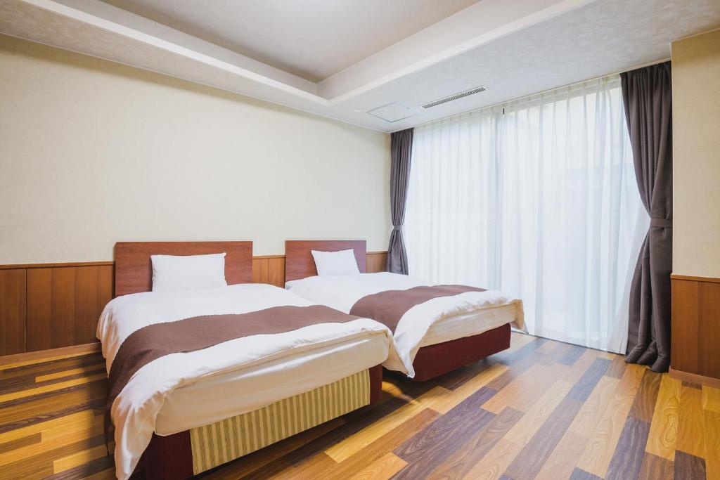 Oedo Onsen Monogatari Awara Twin Room