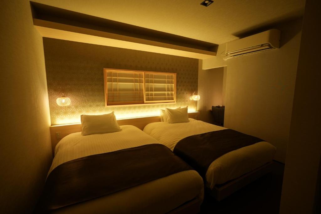 Oyado Sakuragawa Twin Bedroom