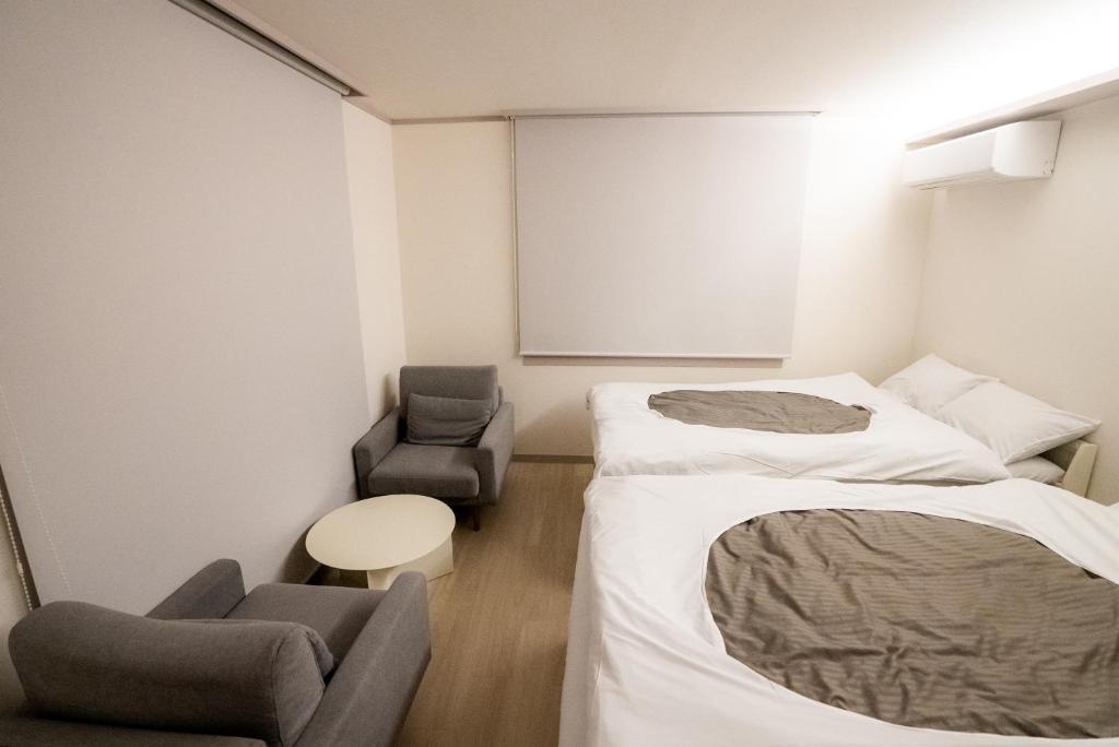 Ozaki Omuro Kogen 9 Chome Twin Room