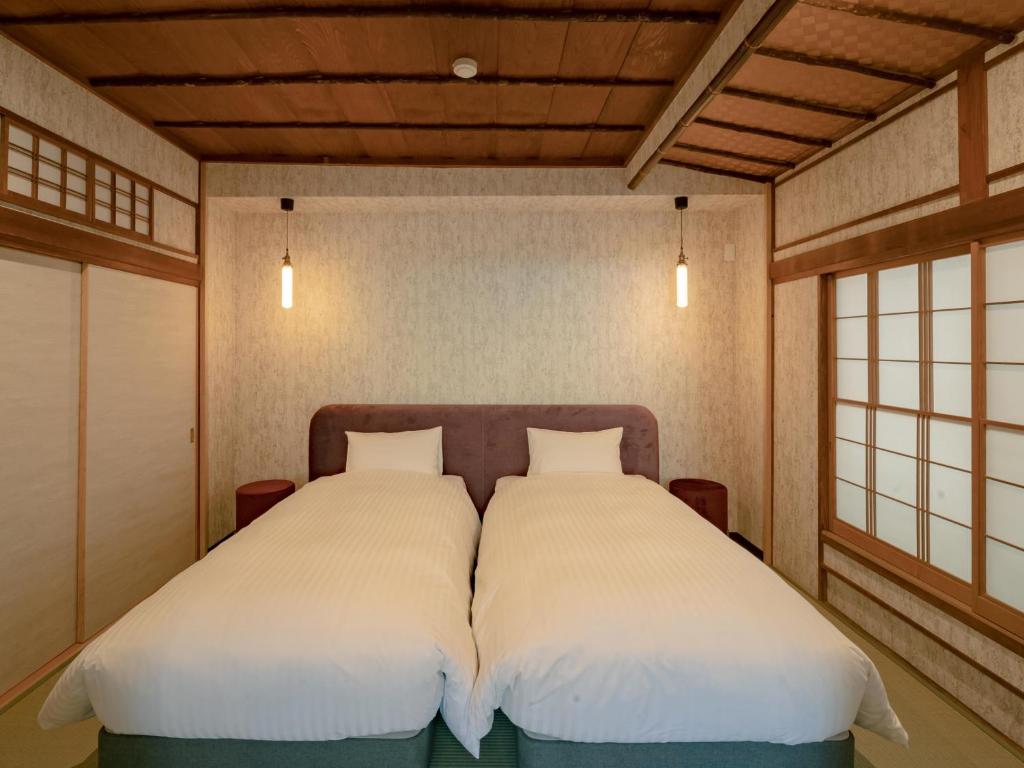 Sen Yugawara Twin Bedroom