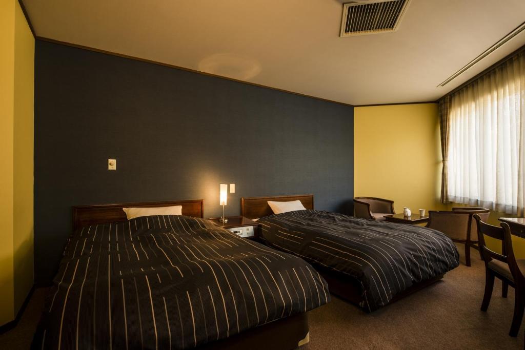 Yamakawa Ryokan Twin Bedroom