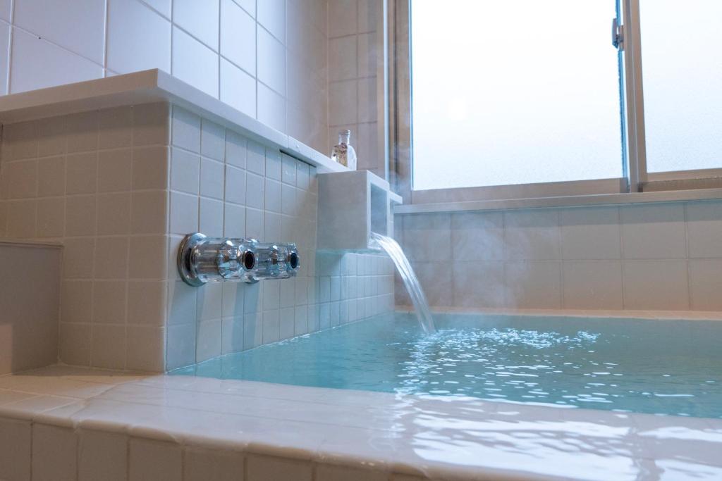 Yumori Onsen Hostel Indoor Onsen Bath