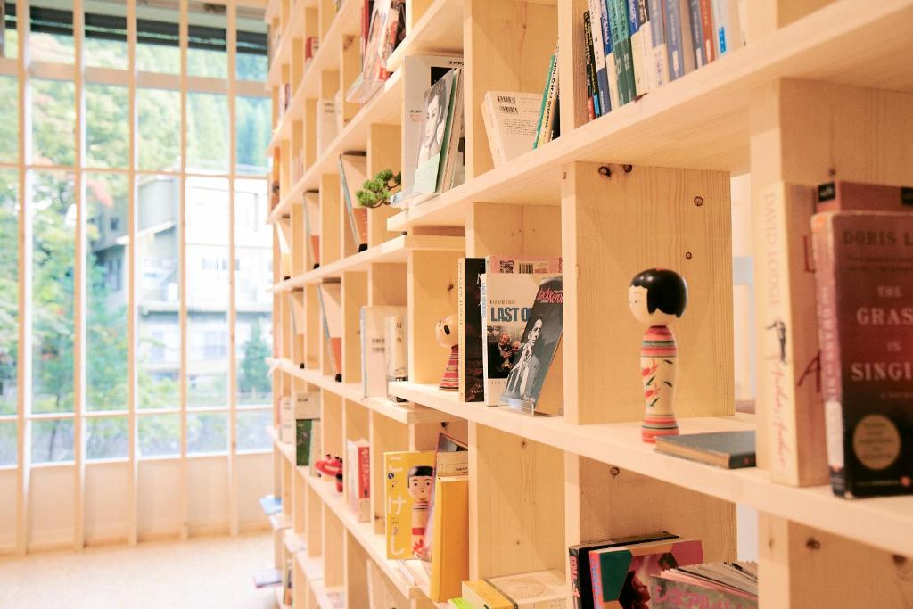 Yumori Onsen Hostel Library Bookshelves